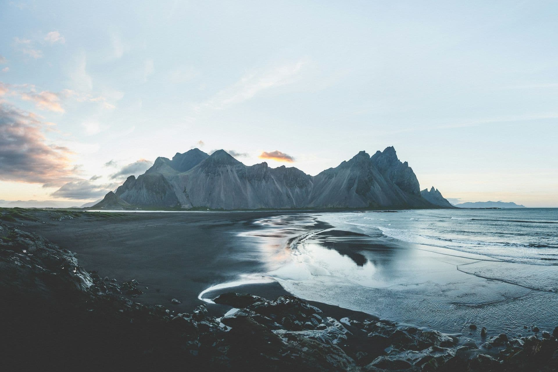 Jagged Vestrahorn mountains above a black sand beach