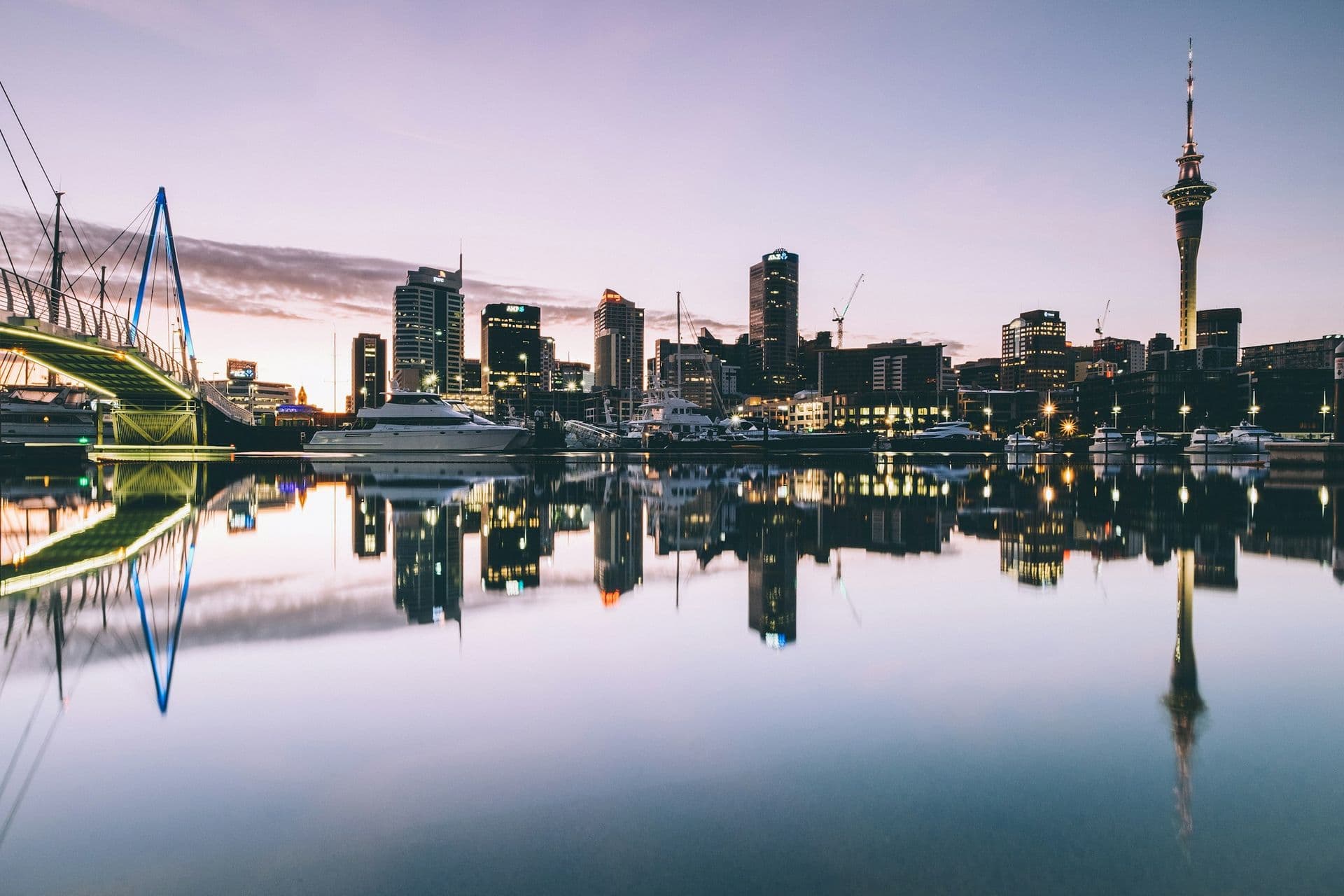 The Auckland skyline reflected in the harbour at dusk